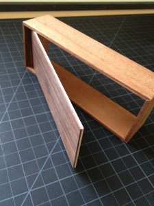 This shows the lamination of basswood and walnut for strength and flatness.